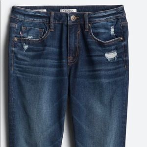 Distressed mid rise jeans